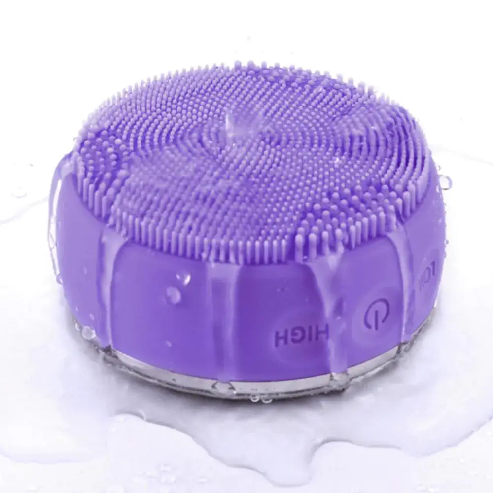 Electric Silicone Pore Cleaner and Heating Facial Wash in water, showcasing its silicone bristles and sleek design.