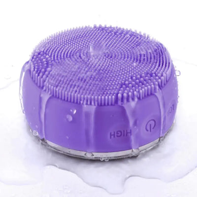 Electric Silicone Pore Cleaner and Heating Facial Wash in water, showcasing its silicone bristles and sleek design.