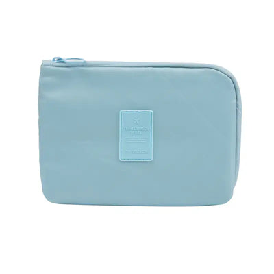 Travel Storage Bag for Digital Products and Cables in light blue color, ideal for organizing gadgets and cables.