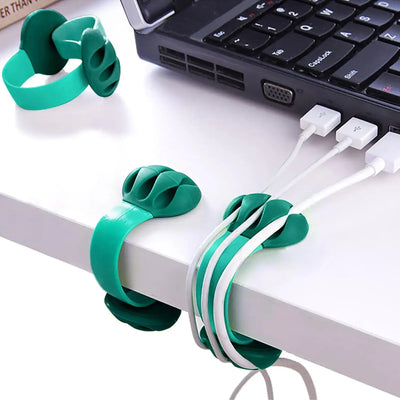 3 Packs Multipurpose Cable Clips organizing cables on a desk near a laptop keyboard, effective wire management.