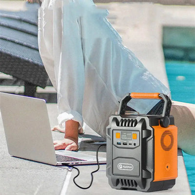 High-power Energy Storage Power Supply connected to a laptop by the pool, showcasing reliable power for outdoor use.