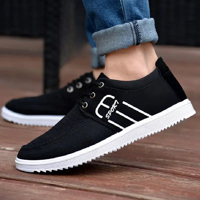 Men's Breathable Casual Sneakers in black with white stripes, designed for comfort and style.