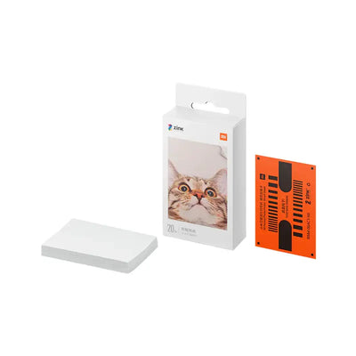 Xiaomi Mini Bluetooth Photo Printer accessory pack with photo paper and colorful packaging featuring a cat.