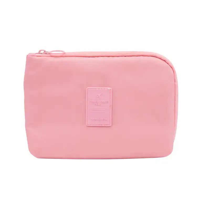Travel Storage Bag for Digital Products and Cables in pink color, perfect for organizing tech essentials.