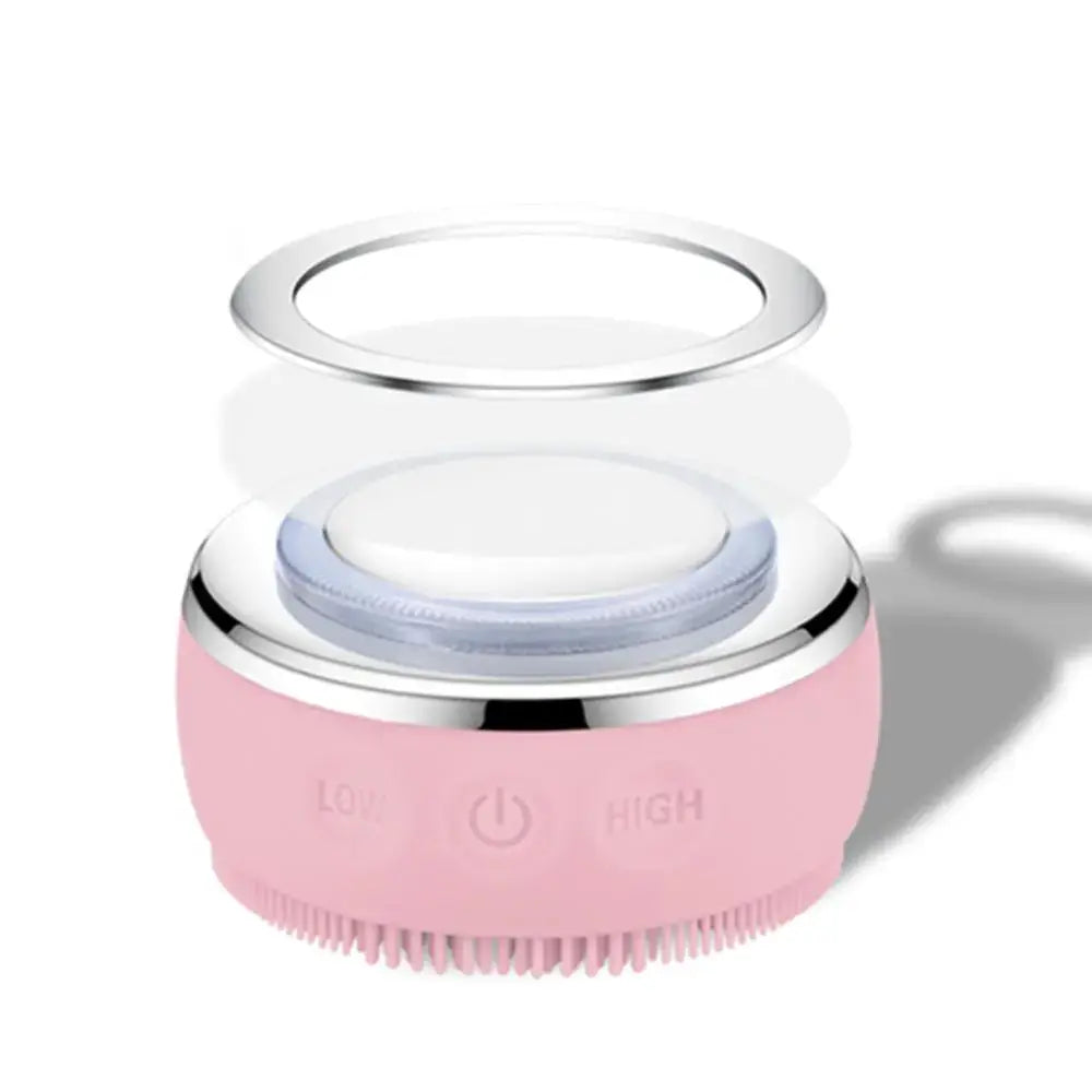 Electric Silicone Pore Cleaner and Heating Facial Wash in pink with electric vibration settings.