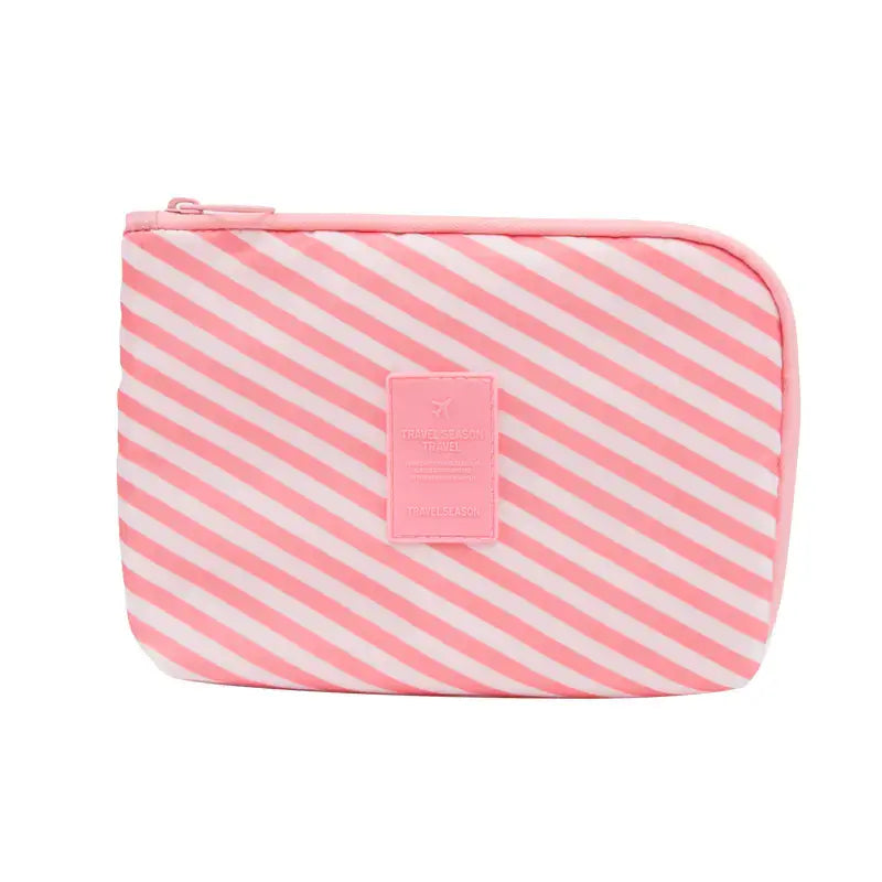 Travel Storage Bag for Digital Products and Cables with pink striped design, perfect for keeping tech organized.