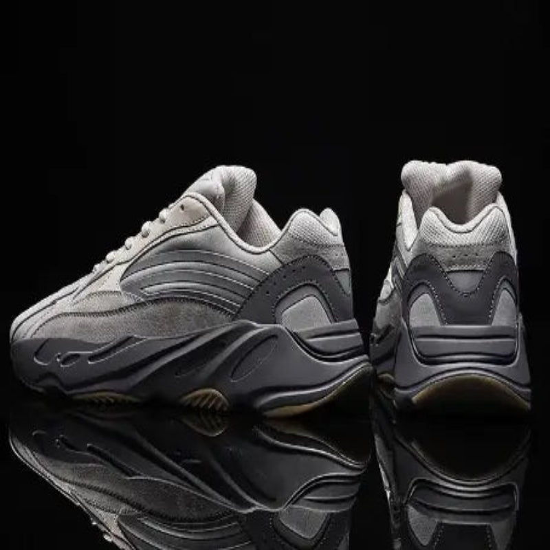 mens-and-womens-retro-mesh-sneakers in gray with a retro design and breathable mesh construction.