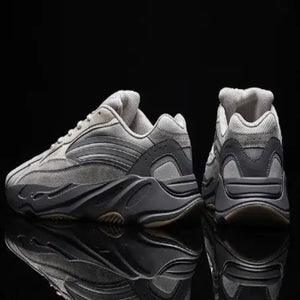mens-and-womens-retro-mesh-sneakers in gray with a retro design and breathable mesh construction.