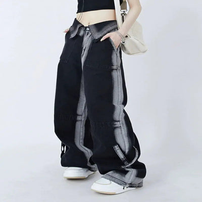 Stylish black cuffed jeans for women, featuring a relaxed fit and chic striped design, paired with sneakers.