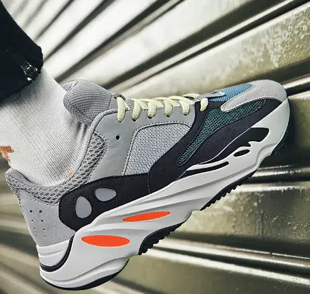 mens-and-womens-retro-mesh-sneakers featuring a modern design with breathable mesh and vibrant color accents.