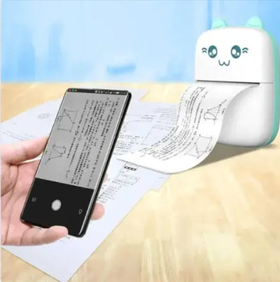 Portable Mini Bluetooth Printer printing from a smartphone, showing paper output with text.