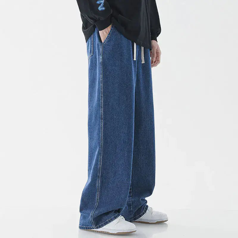 Casual Loose Straight Jeans for Men displayed in relaxed fit with side pockets and drawstring detailing.