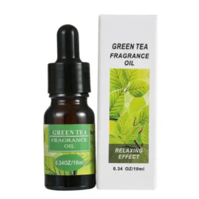 Green Tea Fragrance Oil 10ml bottle next to its box, perfect for relaxing and enhancing humidifier aromatherapy essential oils.