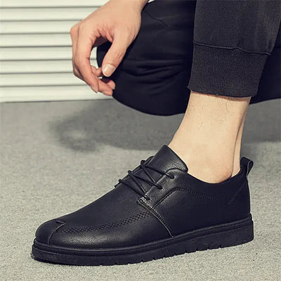 mens-casual-leather-shoes-and-sneakers in black, showcasing style and comfort for modern men.