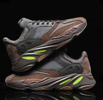 mens-and-womens-retro-mesh-sneakers in gray and brown colorway with neon accents.