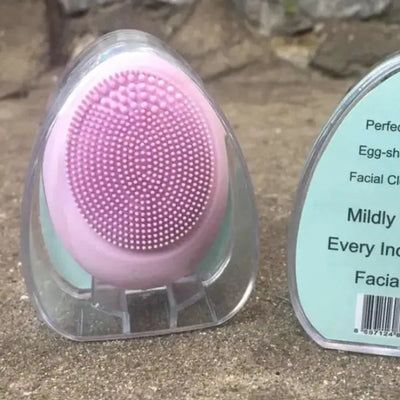 Electric Face Wash - Deep Cleanse with Vibration Technology skincare device in pink color.
