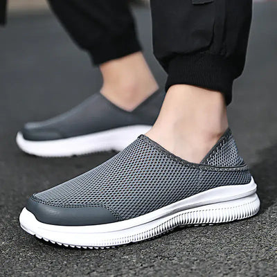 Slip-On Breathable Mesh Sneakers on a person's feet, showcasing the lightweight and breathable design.