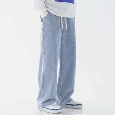 Casual Loose Straight Jeans for Men in light blue featuring a relaxed fit and comfortable design worn with sneakers.
