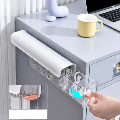 Wall-Mounted Data Cable Storage Box for Chargers on a desk, keeping cables organized and tidy.