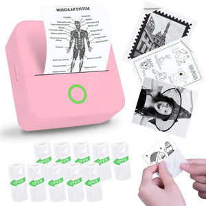 Vicbear Mini Sticker Printer in pink printing stickers with various designs and rolls of sticker paper.
