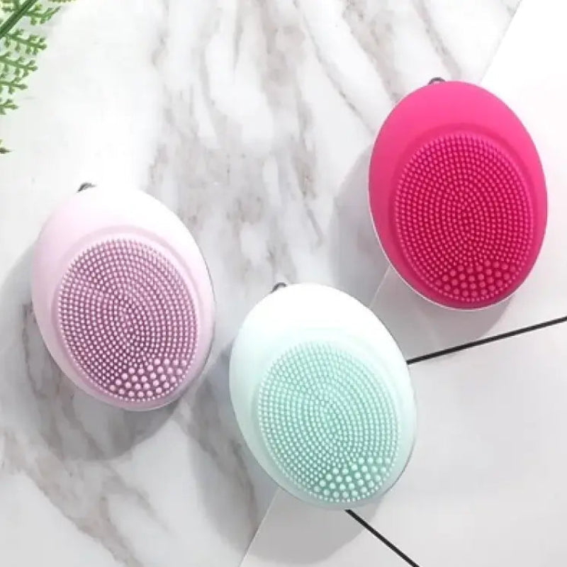 Electric Face Wash devices in pink, mint green, and white, showcasing advanced vibration technology for a deep cleanse.