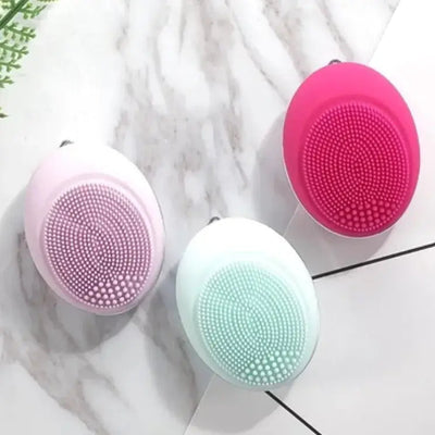 Electric Face Wash devices in pink, mint green, and white, showcasing advanced vibration technology for a deep cleanse.