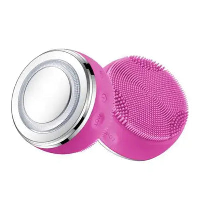 Electric Silicone Pore Cleaner and Heating Facial Wash in pink with soft silicone bristles for deep cleansing.