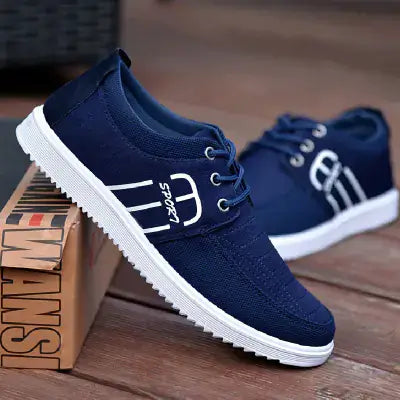 Men's Breathable Casual Sneakers in navy blue with flexible soles and modern design.